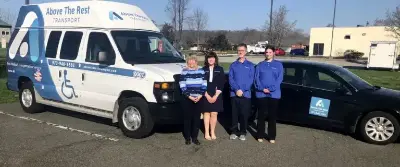 <b>Above the Rest Transport offers both sendan transports (right) and wheelchair-accessible mobility vans (left). File photo.</b>