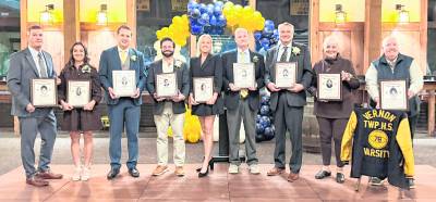 <b>Standing,Vernon Township High School Athletic Director Bill Foley accepts the award for Bob Woortman (78), who could not attend, Elise Fugowski (07), Dan Tintle (12), Justin Gannon (06), Emily Trenz (98), Dan Cleary (84), Jamie Sweetser (79), Arlene Holbert accepting on behalf of her husband Jeff (Coach), and Liz Cleary accepting the award on behalf of Joan Bono (78).</b>