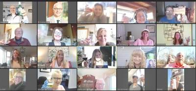 The Green Team Realty associate brokers and agents toast each other on the firm’s first Virtual Happy Hour held last Friday, March 27.