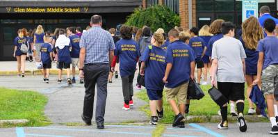 Seventh Grade students enter Glen Meadow Middle School