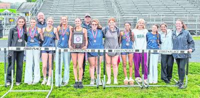 <b>The Vernon Township girls’ track team is shown with the NJAC championship plaque.</b>