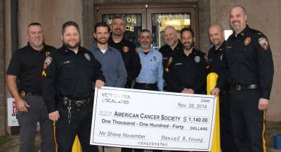 From left, Chief Randy Mills, Corporal Charles Reid, Detective Sergeant Jason Haw, Sergeant Keith Kimkowski, Dispatcher James DiTacconi, Detective Shaun Fitzgerald, Corporal Derrick Scudieri, Ptl. Harry Russo, Lieutenant Daniel Young are shown.