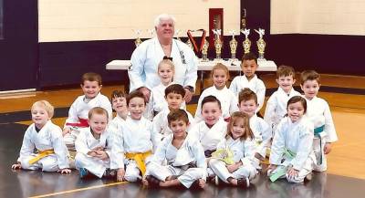 Students at the Vernon Valley Karate Academy pose with their sensei, or teacher, Tom Shull. (Photo provided)