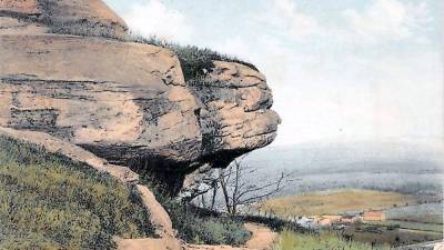 An historical postcard of Witch Rock on Walnut Mountain