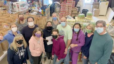 Sparta Ecumenical Food Pantry volunteers on packing day for its 2020 Christmas program (Photo provided)