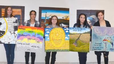 The art students here with their art are, from left, Crystina Kievet (grade 9), Idalis Santiago (Grade 10), Hailey Ipsale (grade 12), Faith Mitchell (grade 12) and Mariel Castro Reynoso (grade 9).