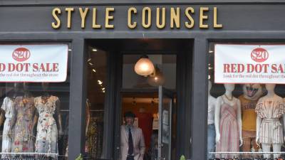 Bob Maxwell, co-owner of Style Counsel in Warwick, N.Y., which has been doing brisk business since retail stores were allowed to reopen with safety measures. (He took his mask off momentarily for the photo.) (Photo by Becca Tucker)