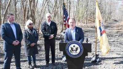 U.S. Rep. Gottheimer today at the future site of the park-and-ride station for the Lackawanna Cut-off railway. He was joined by Andover Committeeman Eric Carr, Andover Committeewoman Janis McGovern, and Andover Mayor Thomas Walsh. (Photo provided)