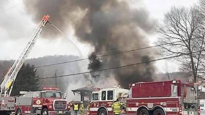Firefighters battle blaze at Bob's Crossroads Service at McCoy’s Corner in Wantage (Photo by Sheila Voelker)