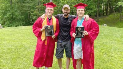 Hobb Engler President Bill Brown celebrates with 2020 scholarship winners John (“Jack”) Cusack and Matthew Credidio (Photo provided)