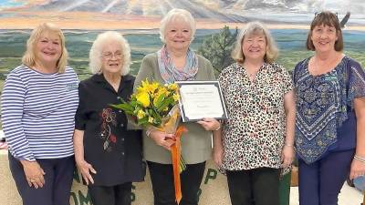 After being nominated by the Vernon Township Woman’s Club, Vernoy Paolini (center) receives the prestigious New Jersey Women of Achievement Award from the New Jersey State Federation of Women’s Clubs. Congratulating her are (from left) Vernon Township Woman’s Club President Maria Dorsey, Vernon Township Woman’s Club member Maureen Blandino, New Jersey State Federation of Women’s Clubs Highlands District Vice President Nancy Levy, and Vernon Township Woman’s Club First Vice President Anne Whitty. (Photo by Lisa Mills)