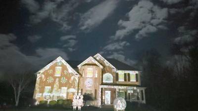 Through high tech projection art, a changing compilation of videos, pictures and gifs tell a story on the Galluccio family’s house. (Photo provided by Elaine Galluccio)