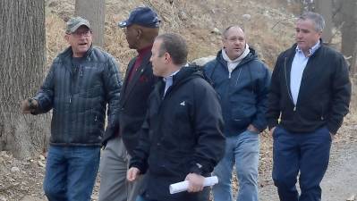 Vernon Township Council President Harry Shortway speaks with Mayor Howard Burrell and U.S. Rep. Josh Gottheimer at the dump site in February, while PAID chairman Martin O'Donnell talks to Assemblyman Hal Wirths (Photo by Mike Zummo)