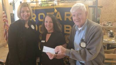 Past President, Alexis Horvath, Edith Lynch, Program Director of the Sussex County YMCA, and current President, Kenneth Wentink