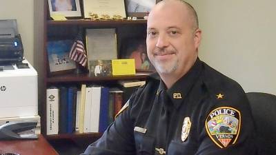 Vernon Township police chief Dan Young sits in his office on Feb. 20.