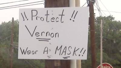 A concerned resident placed a sign on Route 94 in Vernon, stressing the importance of a protective mask.