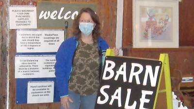 Donna Traylor, barn sale organizer and Lusscroft Farm volunteer, invites potential customers to the barn sale this Saturday May 29th at the farm.