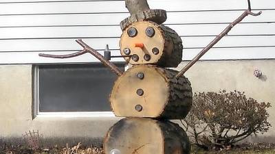 With the absence of January and February snow, a resident of Breakneck Road in Highland Lakes decided to create a snowman from alternate materials.