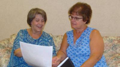 Deb Fisher, left, and Pat Faris diligently organize the 2019 Fall into Health and Wellness Fair to be held on Sept. 28