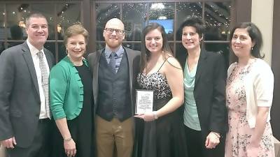 From left, AD Bill Foley, Principal Dr. Anderson, Volleyball Coach Matt Sorensen, Scholar Athlete Olivia Vizzini, Softball Coach Kerry Ludeking and Science Teacher Stella Foco.