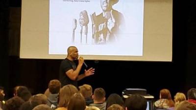 DMC speaks at Glen Meadow Middle School.