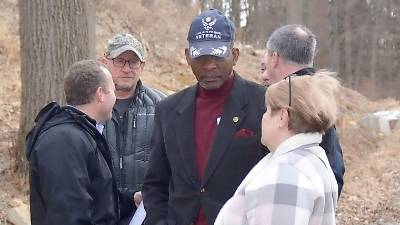 Vernon Township Mayor Howard Burrell talks to Environmental Commission member and Silver Spruce Drive resident Peg Distasi in February.