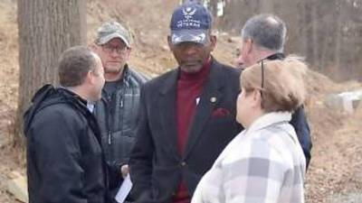 Vernon Township Mayor Howard Burrell talks to Environmental Commission member and Silver Spruce Drive resident Peg Distasi in February