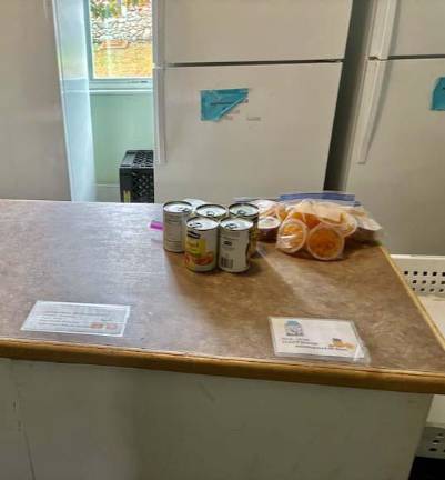 Only a few canned goods and fruit cups were left after a mid-October distribution at the Ecumenical Food Pantry of Pike County. (Photo provided by Jim Snodgrass)