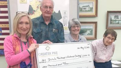 From left: Greater Pike Community Foundation Executive Director Jenni Hamill, Shohola Railroad and Historical Society President Rolf Buchman, member Linda Harding-Buchman, and board member Lorraine Gregory (Photo provided)