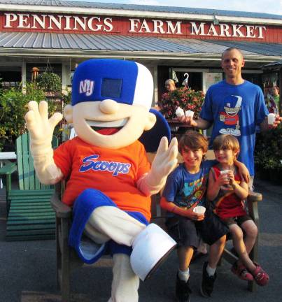 On Thursday evening, June 21, Timmy Grins and the New York Scoops mascot introduced and served lots of free Apple Ice to happy customers like Sebastian Astorino, 8, and his brother Rowan, 4, at Pennings Farm Market in Warwick, N.Y.