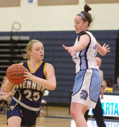 Vernon's Katie Dulmer is covered by Sparta's Meghan Boryeskne.