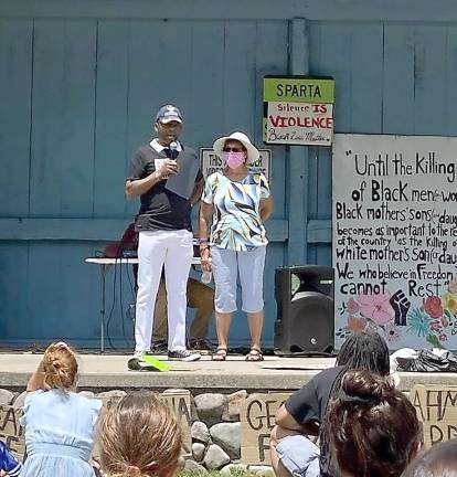 Vernon Township Mayor Howard Burrell addresses the Black Lives Matter rally in Sparta on Saturday with his wife, Reba, at his side (Photo provided)