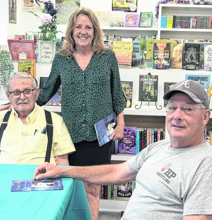 <b>Pictured, from left, are author William Bathgate and book signing attendees Debbie Anderson and Mickey Thomas.</b>