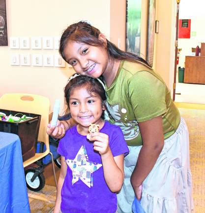 <b>Citlali and Cailtin Contreras of Hackettstown pose for a photo.</b>