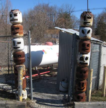 McAfee Hardware&#x2019;s old propane tanks are creatively made into propane tank totem poles.