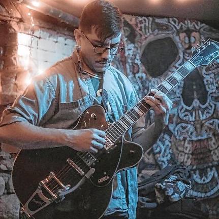 <b>Indie-folk singer-songwriter Justin Cole plays Thursday, July 24 at Krogh’s Restaurant &amp; Brew Pub in Sparta. (Photo courtesy of Justin Cole)</b>