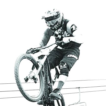 Local pro racer George Ryan of Vernon is shown airborne during Sunday's professional racing circuit held at Mountain Creek. Ryan placed 7th in a field of 55 racers in the men's professional division.