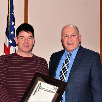 PHOTO PROVIDEDLt. Gregory Williams, left, is shown with Wantage Township Mayor Ronald Bassani.