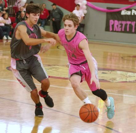 Vernon's D.J. Springstead dribbles the ball while covered by High Point's Donald Bassani in the second half. Springstead scored nine points, grabbed one rebound and made two assists.