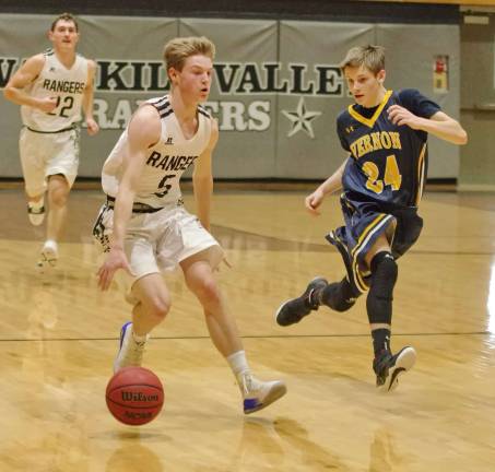 Wallkill Valley's Shawn Falk handles the ball in the second period.