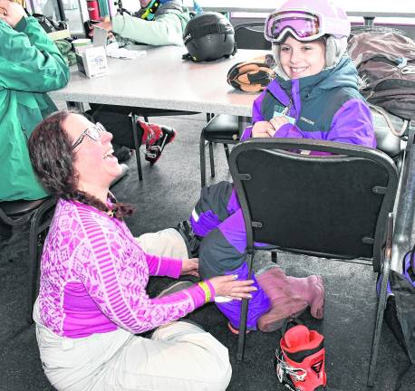 <b>Ashley and Astrid Harp of Florida, N.Y, share a laugh.</b>