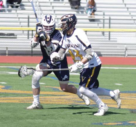 Vernon's Kevin Parisi (13) carries the ball.