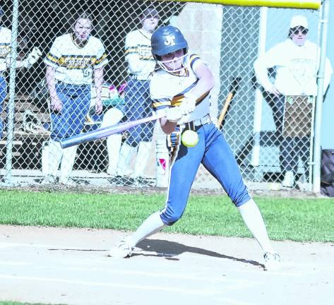 <b>Jefferson batter Maya Weber swings the bat. Weber scored 2 runs.</b>