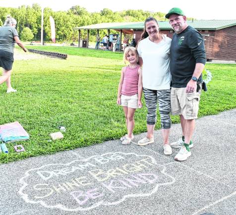 <b>Piper, Michelle and Karl Briddon of Vernon, wrote: Dream big Shine Bright Be Kind on the walk way.</b>