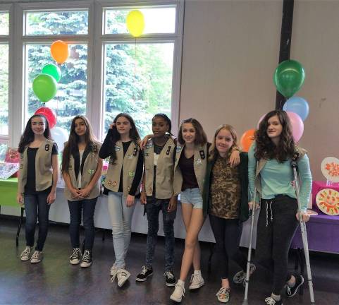 Girl Scout Troop 101 from left to right, Abigail Morris, Audrey Sacks, Joan Guarda, Madisyn Phillips, Deanna Lubertazzo, Muriel Gibson and Isabella Turndorf.