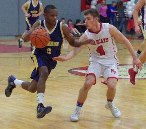 Vernon's Kahlil Stewart (3) drives the ball past High Point's Kyle Adams (4).