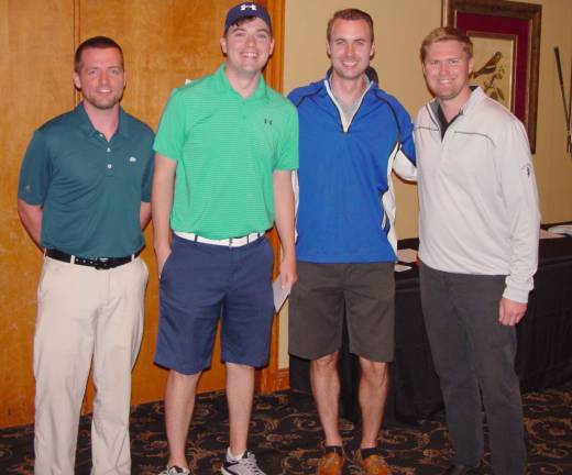 Thomas Freeman and Jim Ruane receive their prizes from Black Bear GM Ryan Delaney and Golf Concierge Kevin Wagoner
