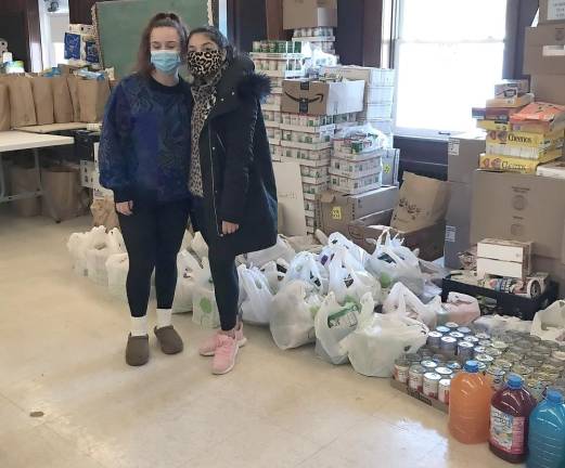 Bhavika Dawar and Jamie Rubin donate food they received as the result of a GoFundMe page, Feeding Sussex County Covid19.