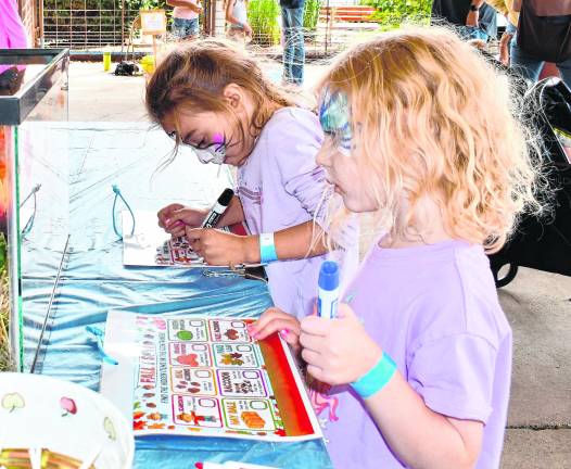<b>Katherine and Kennedy Kelly of Vernon draw.</b>