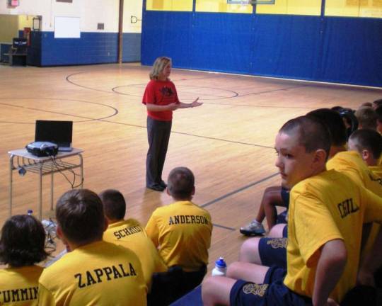 Ashley Craig is shown speaking at teh Junior Police Academy in Jeferson Township in August 2012.